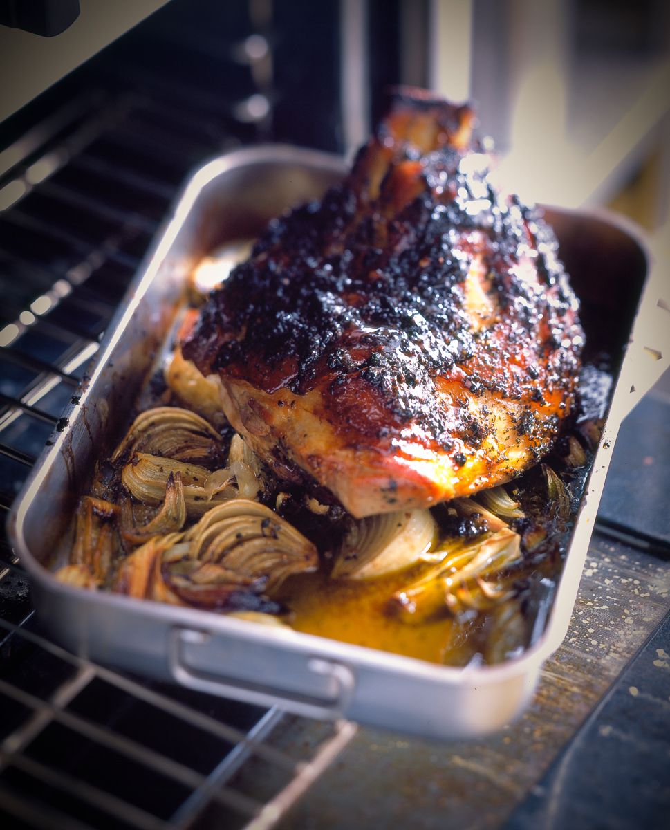 Baked ham with onions and drippings in the oven  www.rkjacobs.comtop food photographer New York Seattle Portland Robert Jacobs photography ©2013