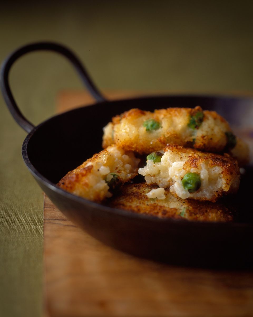 Risotto cakes with peas in cast iron pan, Deen Brothers   www.rkjacobs.comtop food photographer New York Seattle Portland Robert Jacobs photography ©2013