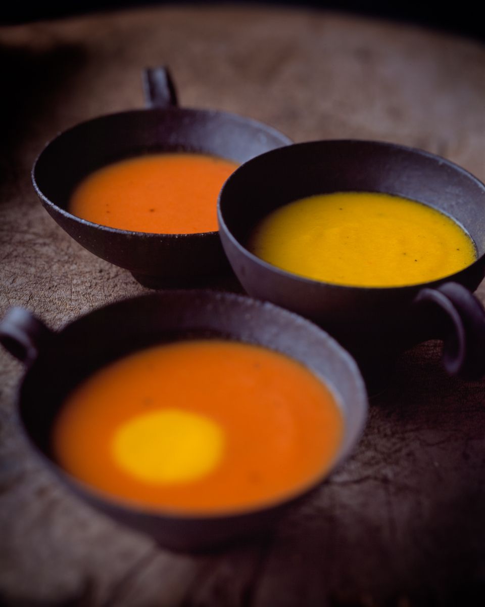 www.rkjacobs.com colored soups,rustic,spice,squash,tomato,warm,winter  black bowls top new york seattle food photographer  Robert Jacobs Photography ©2013