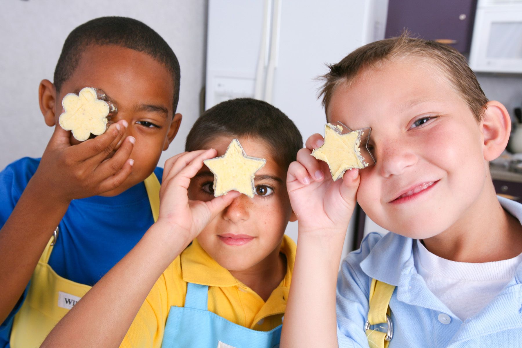 Three boys clad in aprons holding star cookie cutters up to eyesDiabetic Living, Meredith, www.rkjacobs.comTop Food Photographer New York Seattle PortlandRobert Jacobs Photography ©2013 Three boys clad in aprons holding star cookie cutters up to eyesDiabetic Living, Meredith, www.rkjacobs.comTop Food Photographer New York Seattle PortlandRobert Jacobs Photography ©2013Robert Jacobs Photography ©2013