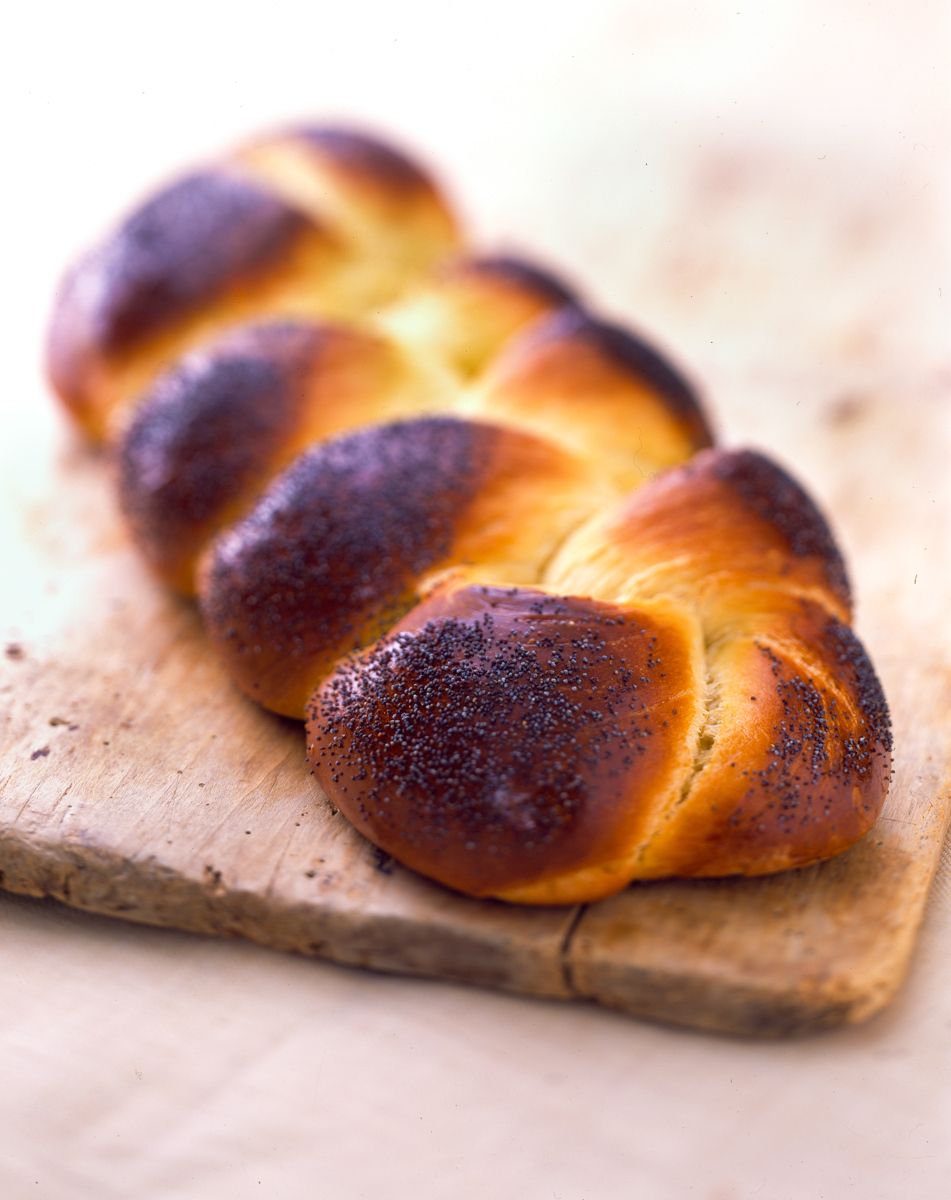 Honey Bake Challah on rustic cutting board www.rkjacobs.comtop food photographer New York Seattle Portland Robert Jacobs photography ©2013