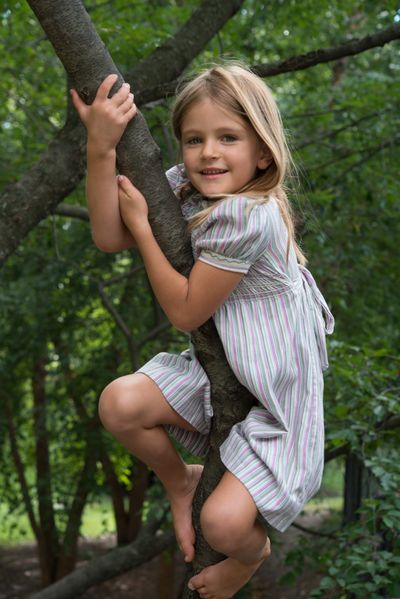 happy girl climing tree_DSC1740.jpg