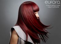 Photo of Beauty photograph of model with red hair, frozen in motion,  for Eufora Hair campaign.