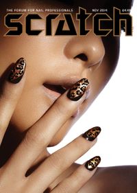 Asian model with leapord nail art for Scratch magazine cover and dramatic lighting