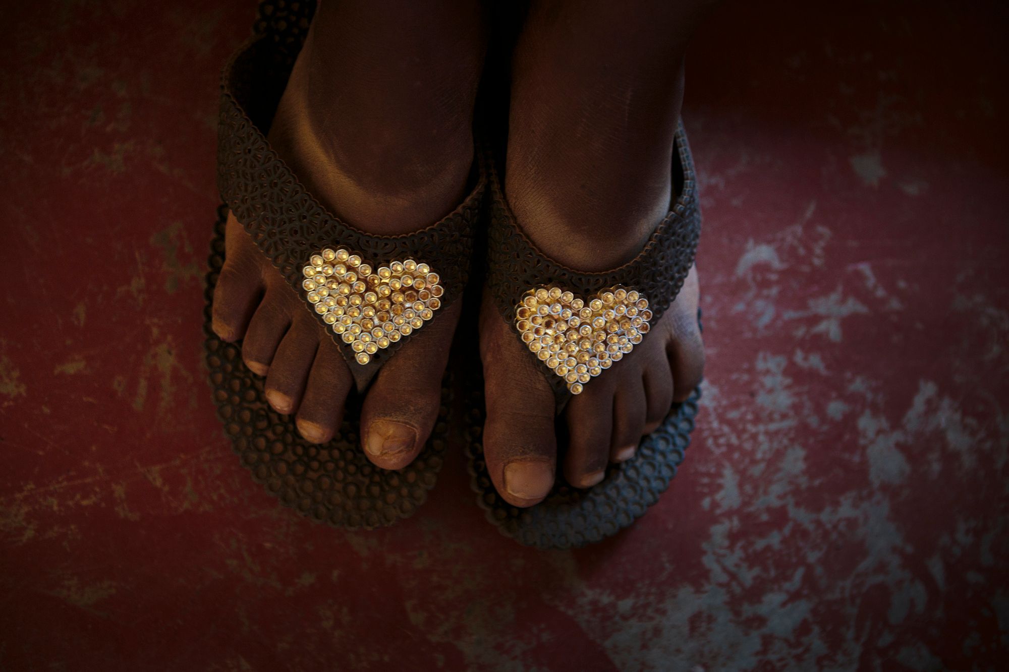 Naserian’s sandals on the day she arrived at the safe house. While still struggling for supplies, the organisation does its best to provide clothing, food, blankets -- and most of all, safety -- to the girls who need shelter. 13.jpg