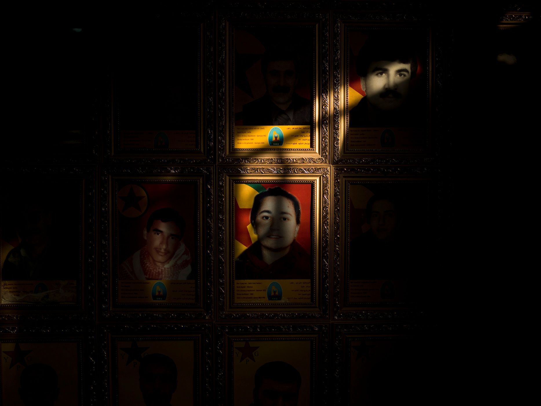 Wall covered with portraits of martyred PKK members (Kurdistan's Workers' Party) in Qamishlou. 10.jpg