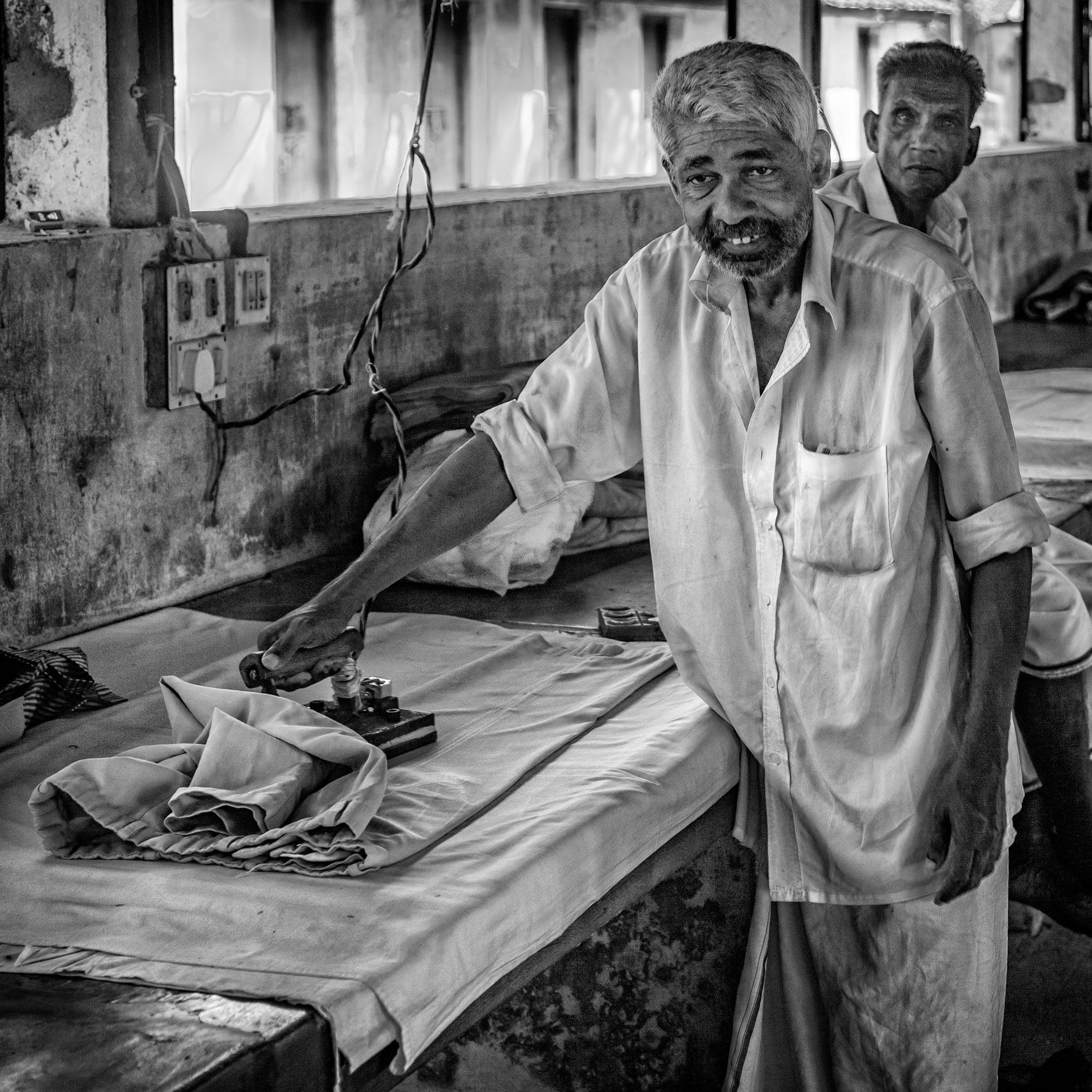 Laundry Presser (near Kochi, Kerala) work.laborers-7.jpg