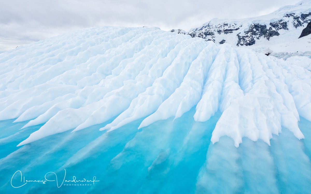ice-sculpture-with-patterns-and-blue-water_s6a9580-paradise-bay-antarctica.jpg