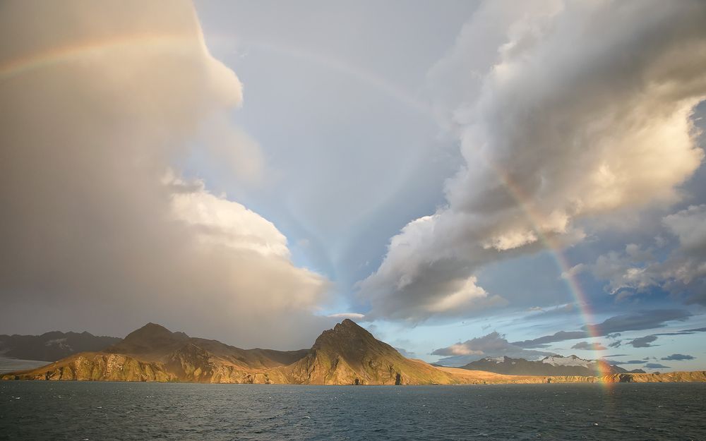 Rainbow over the coast_83A4447-Saint Andrews Bay, South Georgia Island.jpg