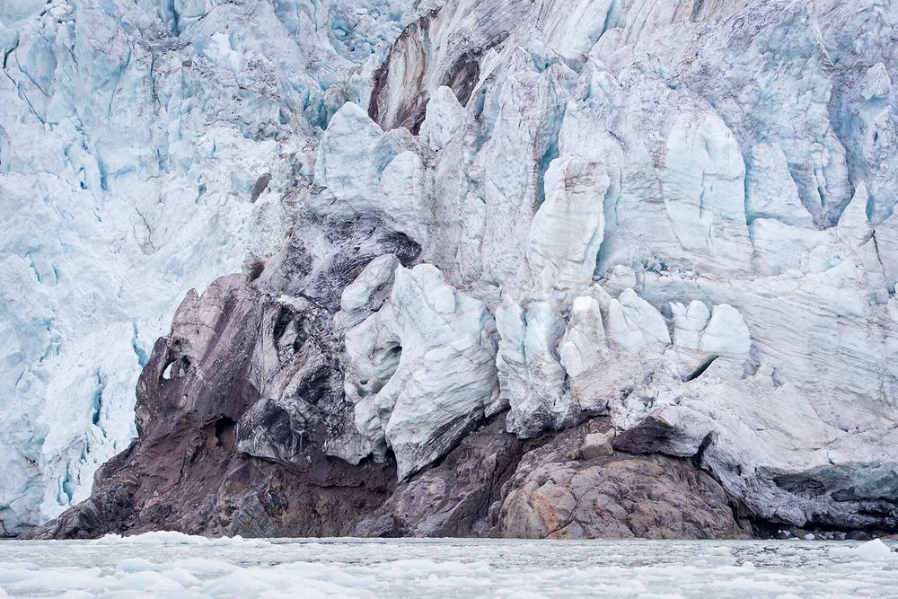 Glacier-ice-detail-on-rock-bottom_E7T2859-Hamiltonbuka,-Svalbard,-Arctic.jpg