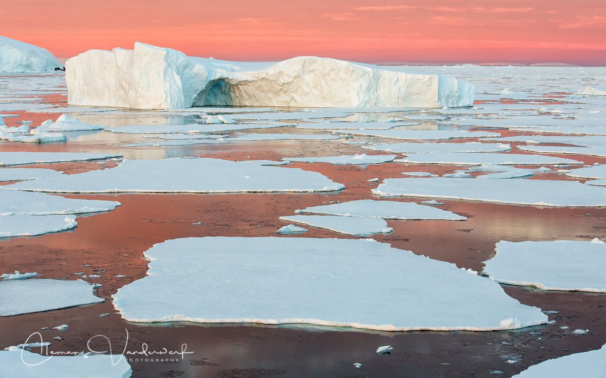 ice-berg-floating-among-sea-ice-with-pink-sky_s6a9029-graham-coast-antarctica.jpg