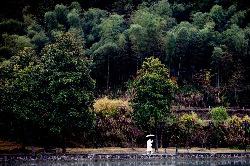 Xidi Ancient Village, China,  Copyright Melissa Lynn 2019 Women in the Rain