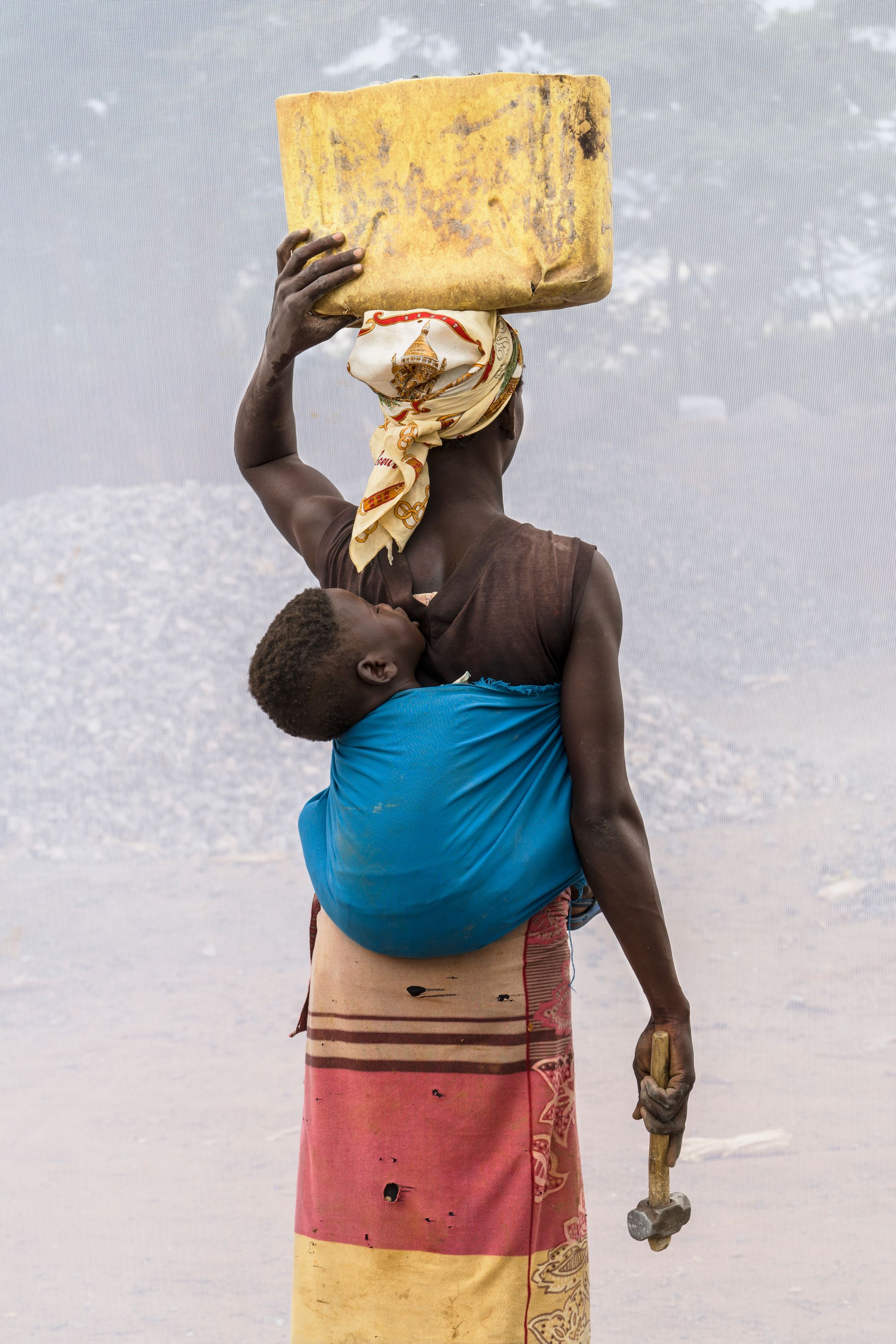 A. Vicky: Age 18 with her son Michael: Age 10 months. Working in quarry for one year.