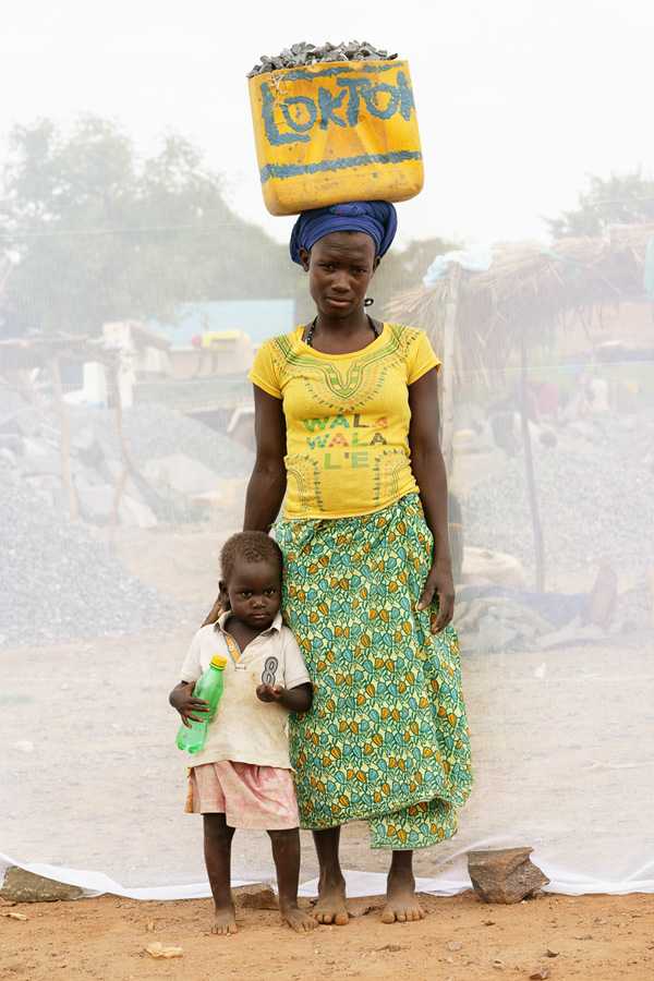 Quarry worker with her son