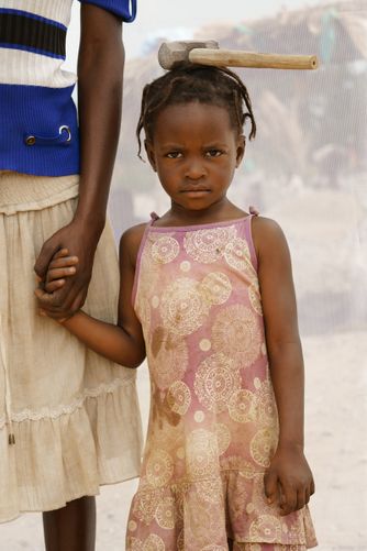 HOPE: AGE 4 & HER MOTHER AMITO NANCT FAITH: AGE 19 WORKING IN QUARRY FOR 10 YEARS