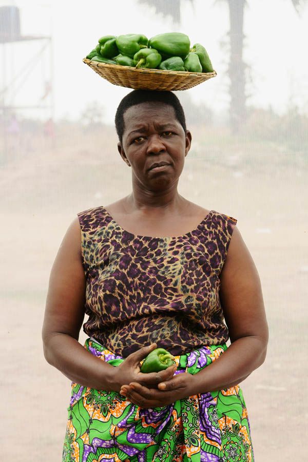 A. Rose: Age 52. Selling green peppers. Selling vegetables for 20 years.