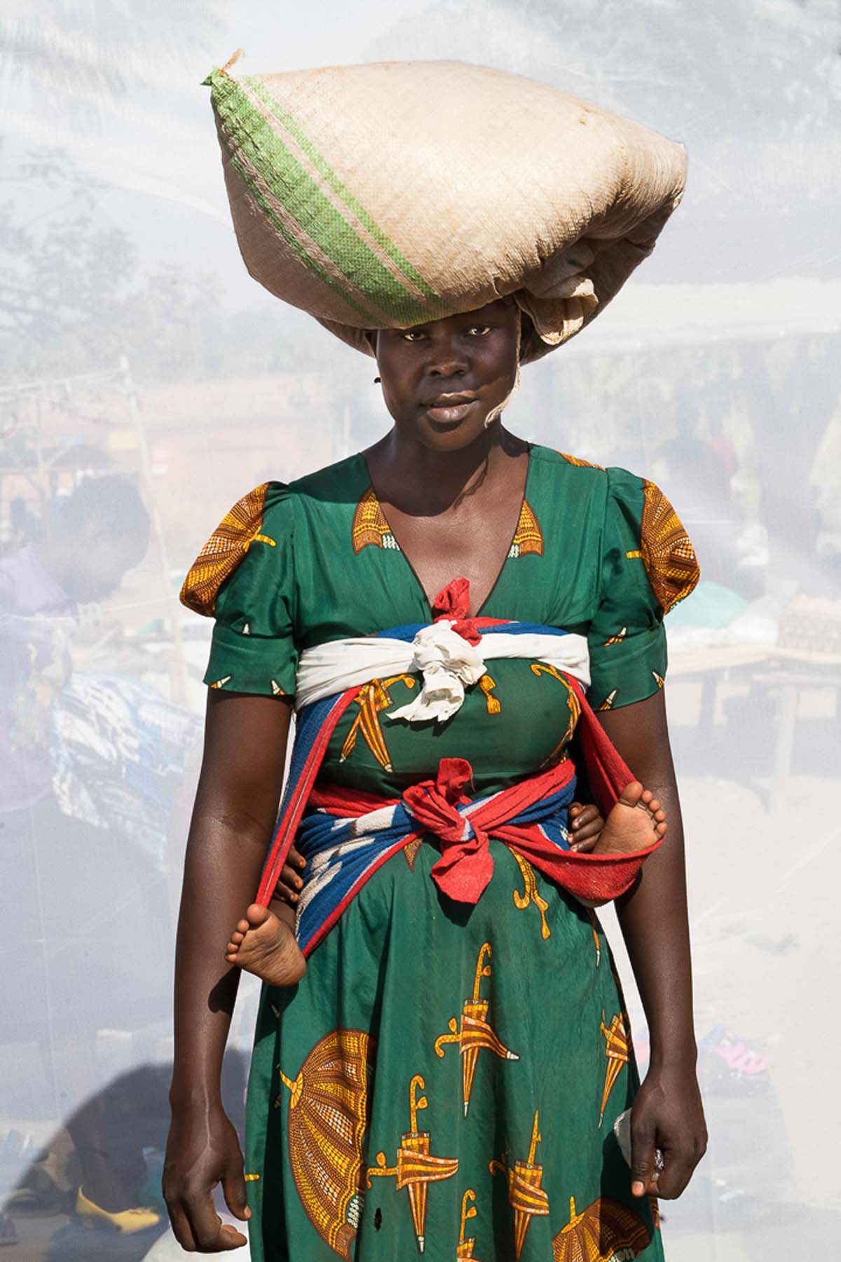 Mother selling used clothes