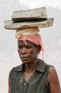 Alica Acan (age 40) working in quarry for seven years.