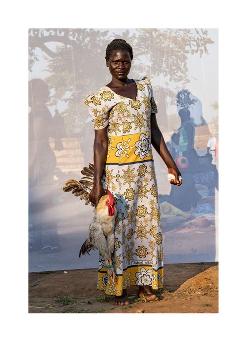 AKELLO NANCY: AGE 28SELLING POULTRY FOR THREE YEARS