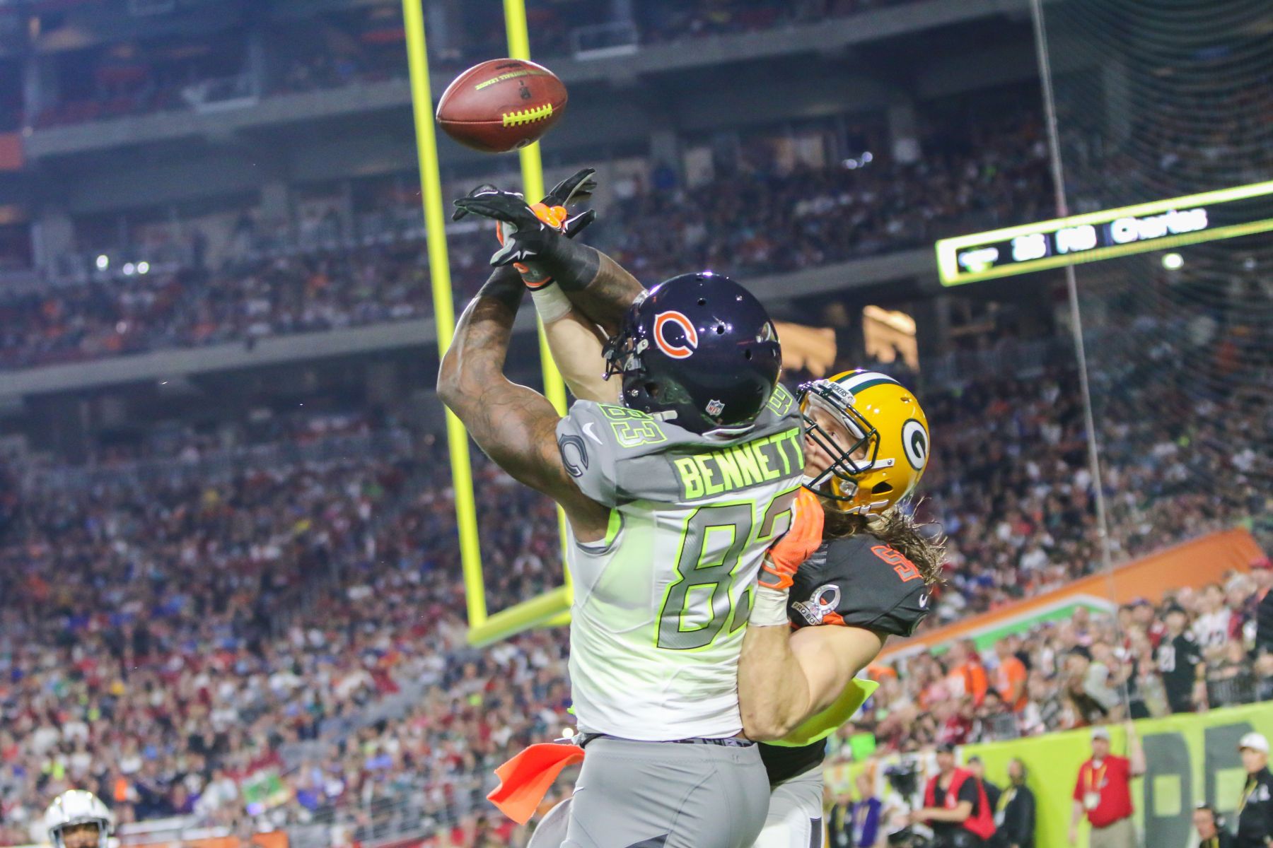 Clay Mathews break up a pass