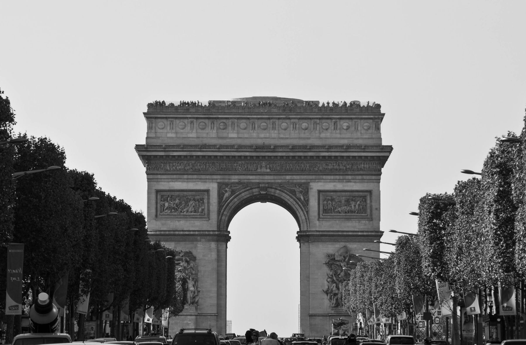 The Arc de Triomphe de l'Étoile is one of the most famous monuments in Paris, France. It stands in the centre of the Place Charles de Gaulle, at the western end of the Champs-Élysées. The Arc de Triomphe