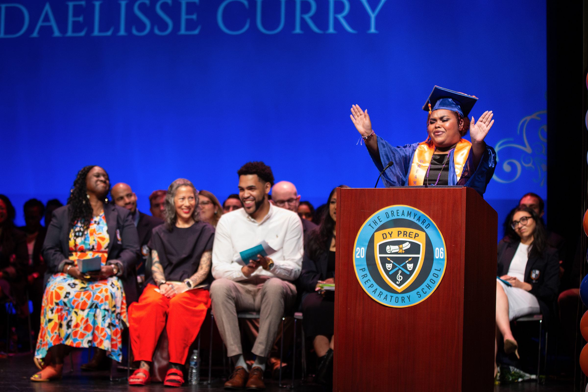 Daelisse Curry giving award speech at DramYard graduation