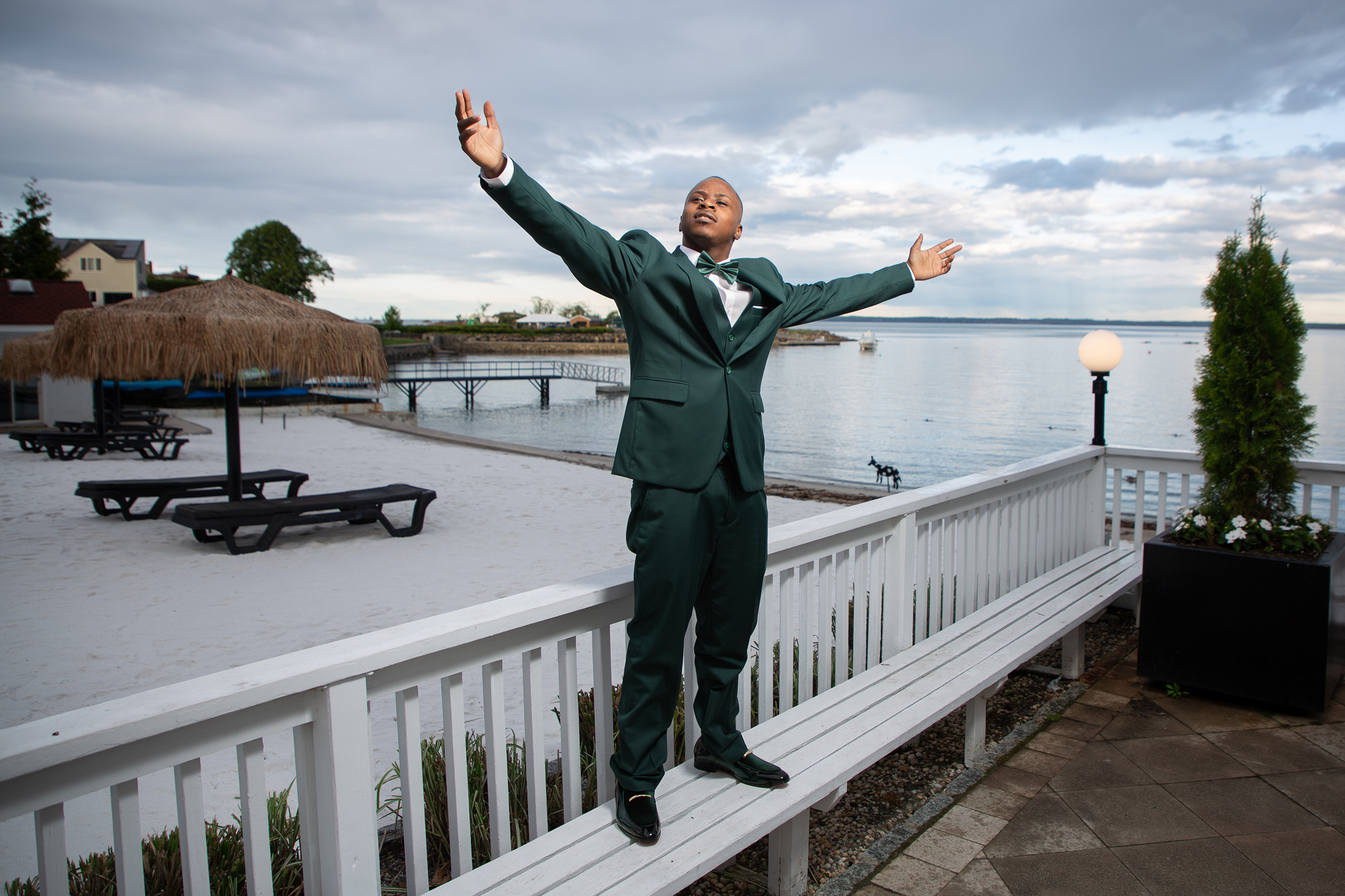 Prom Portrait – Student in Green Tuxedo at Sunset