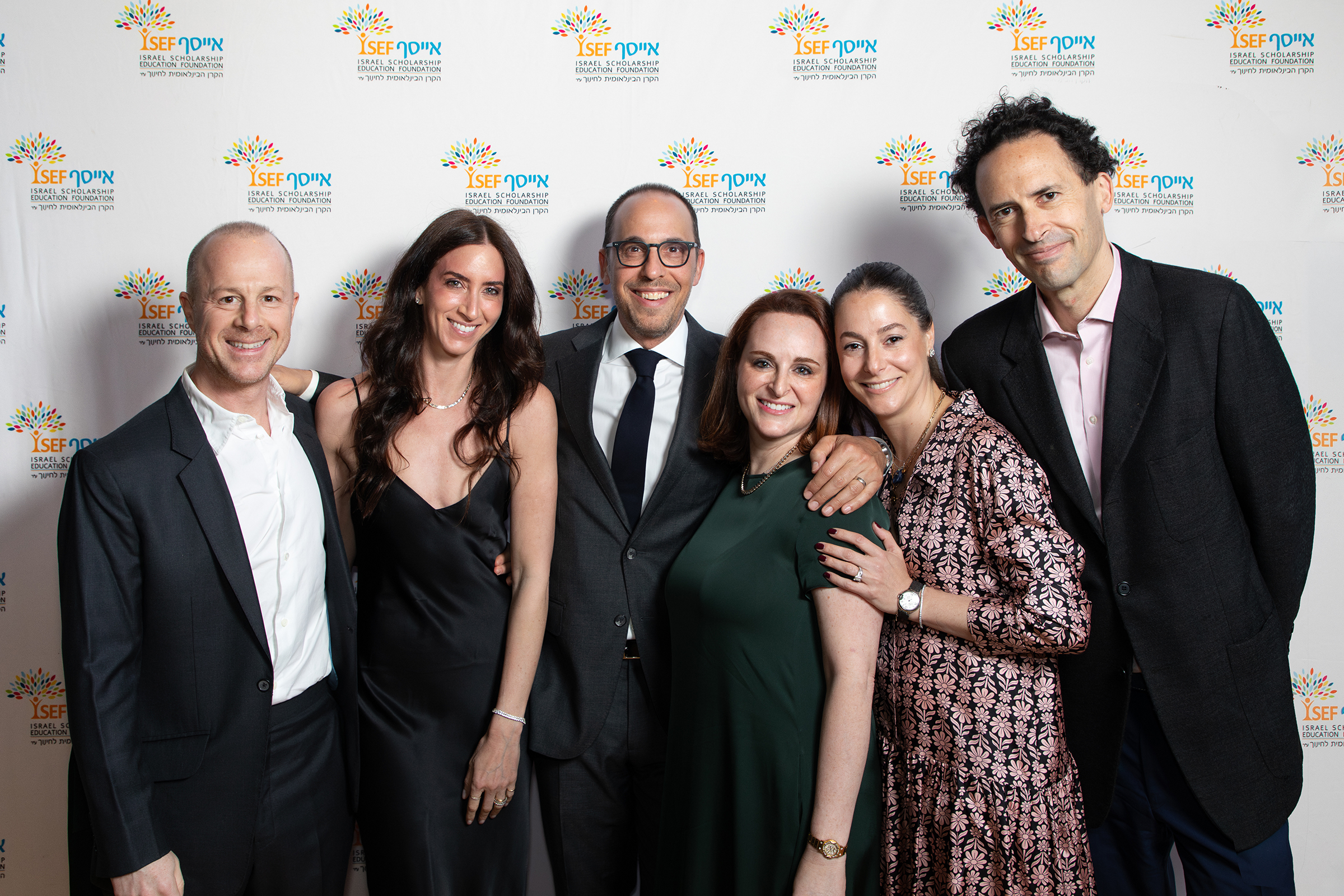 Group of guests at ISEF gala step and repeat