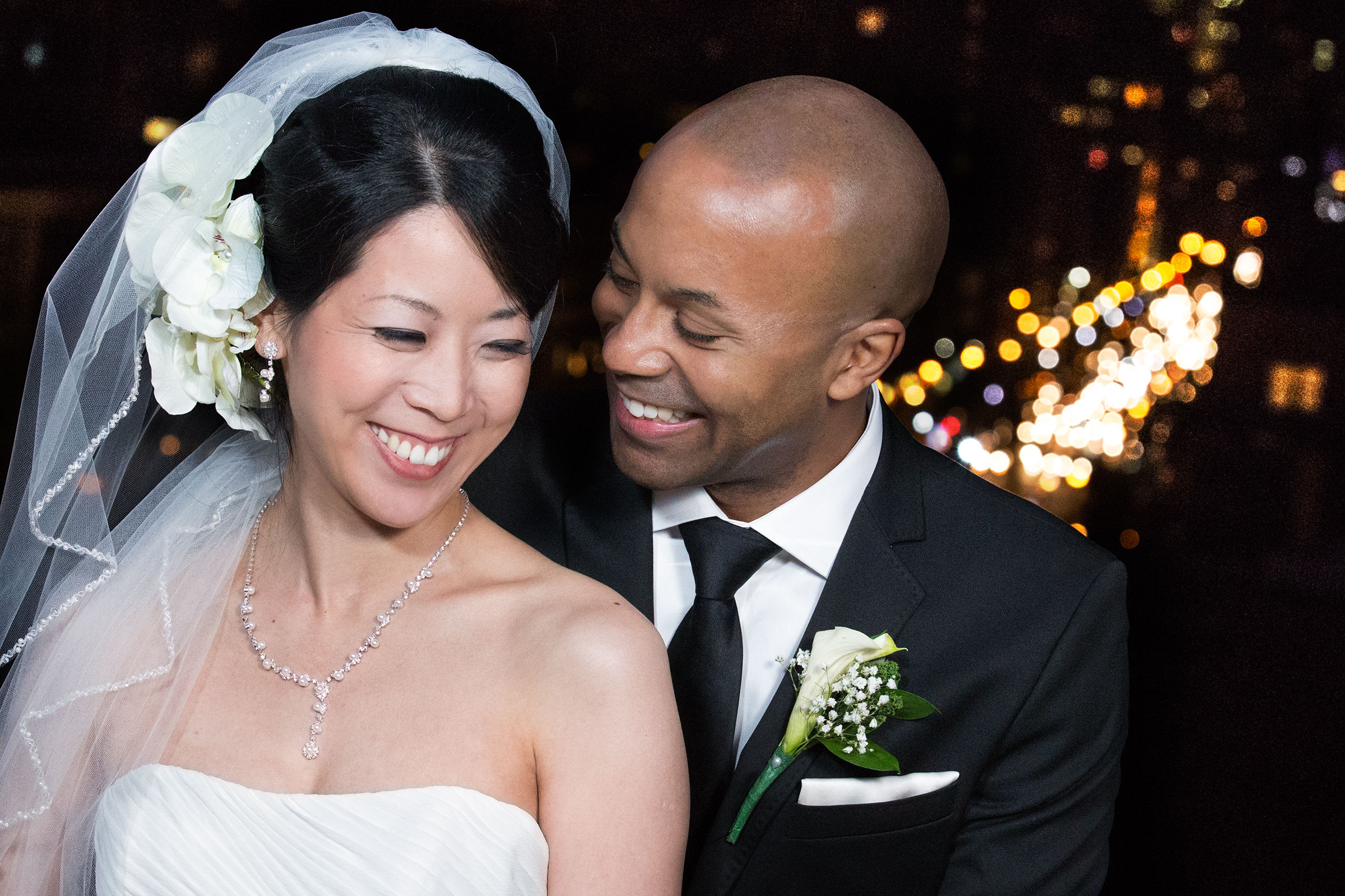 Night rooftop wedding portrait with 6th Avenue lights