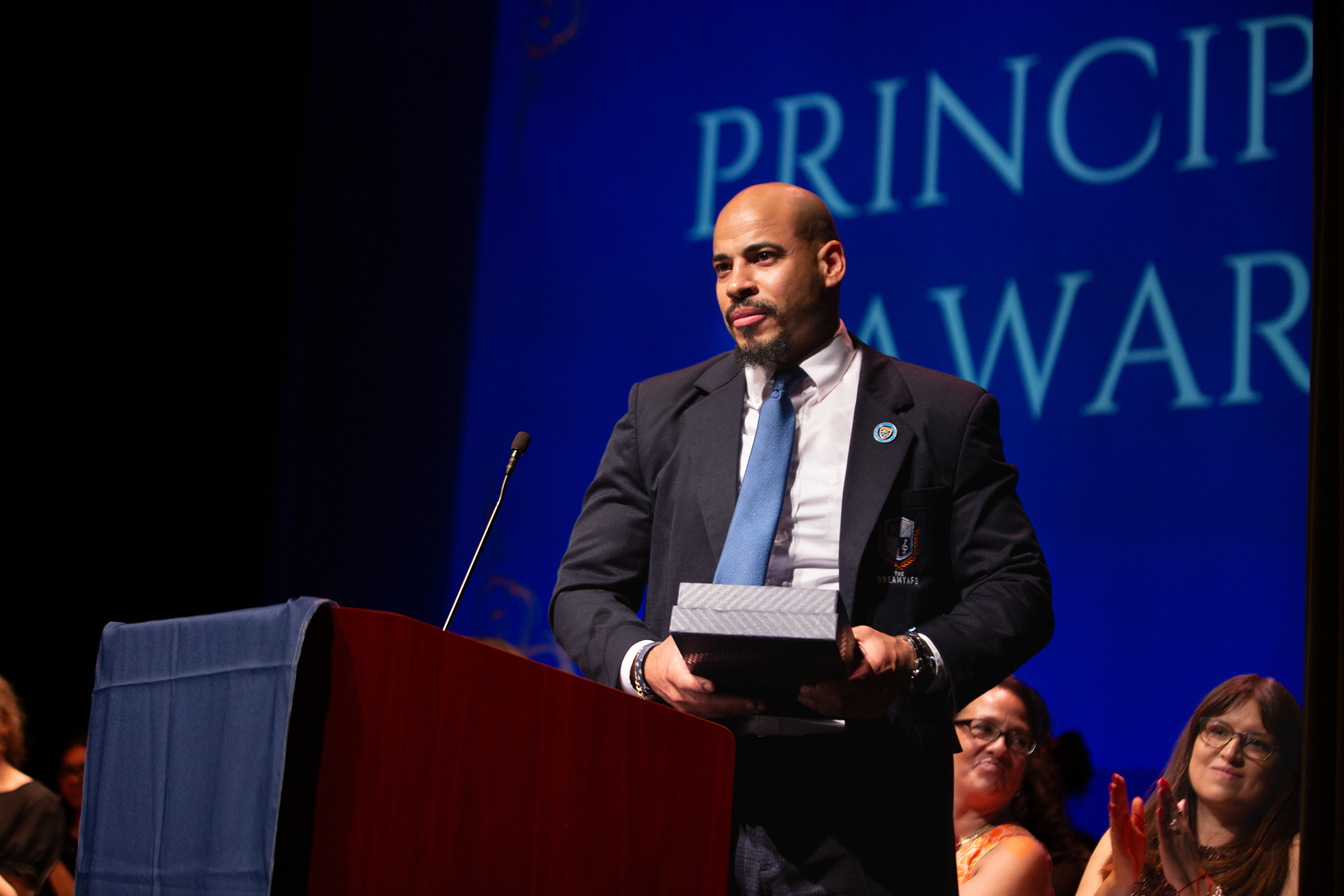 Principal Anthony Altú presenting Principal’s Award