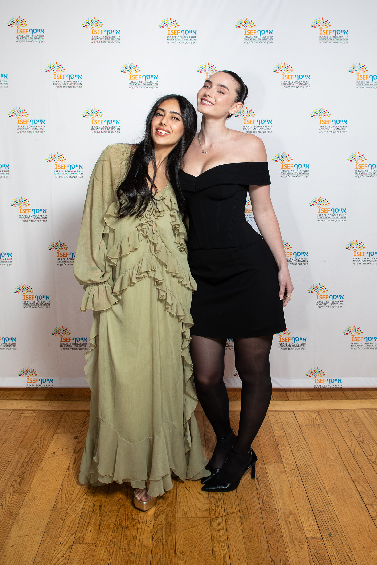 Two women posing at ISEF gala step and repeat