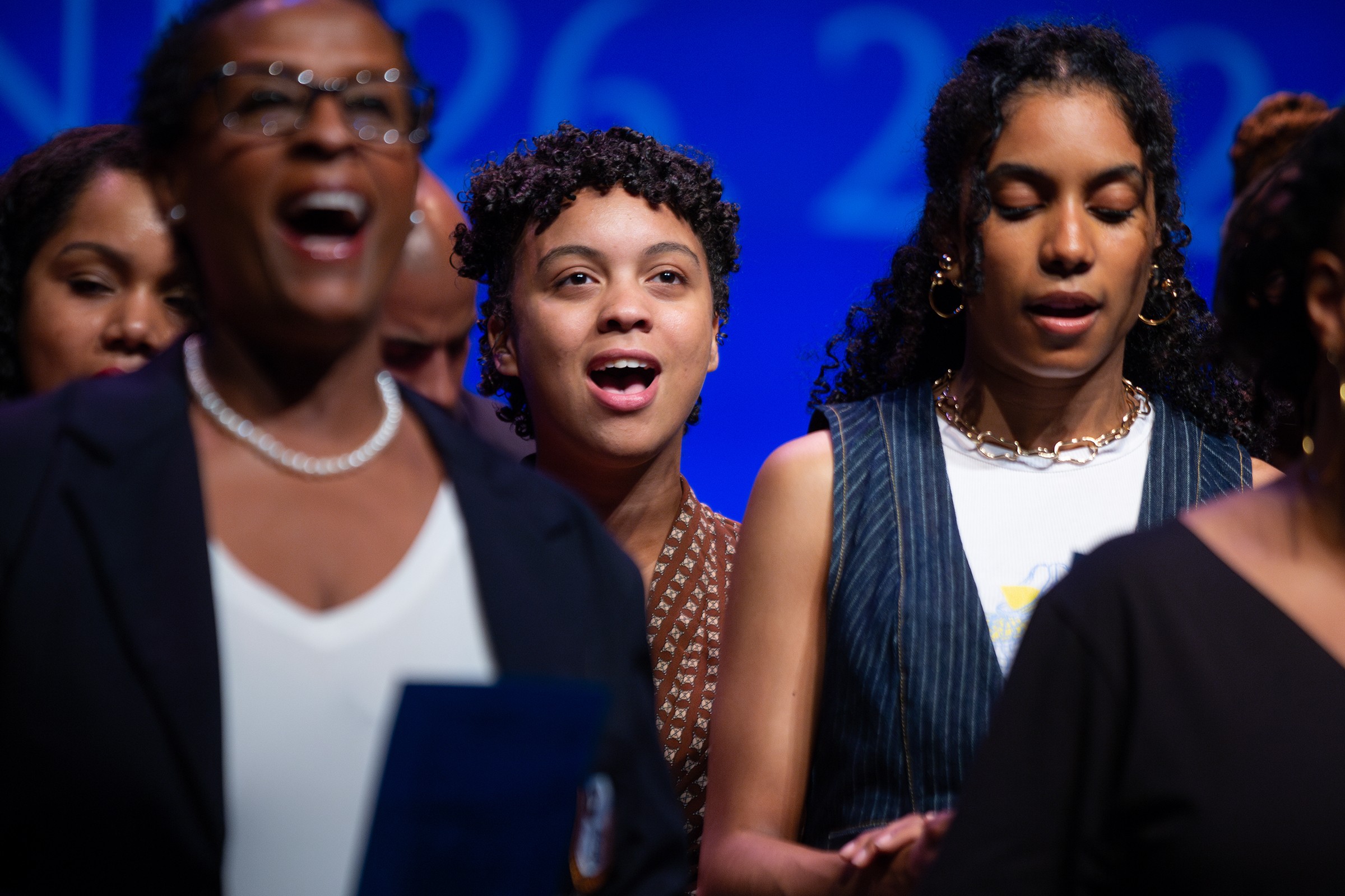 eachers singing onstage at DreamYard graduation
