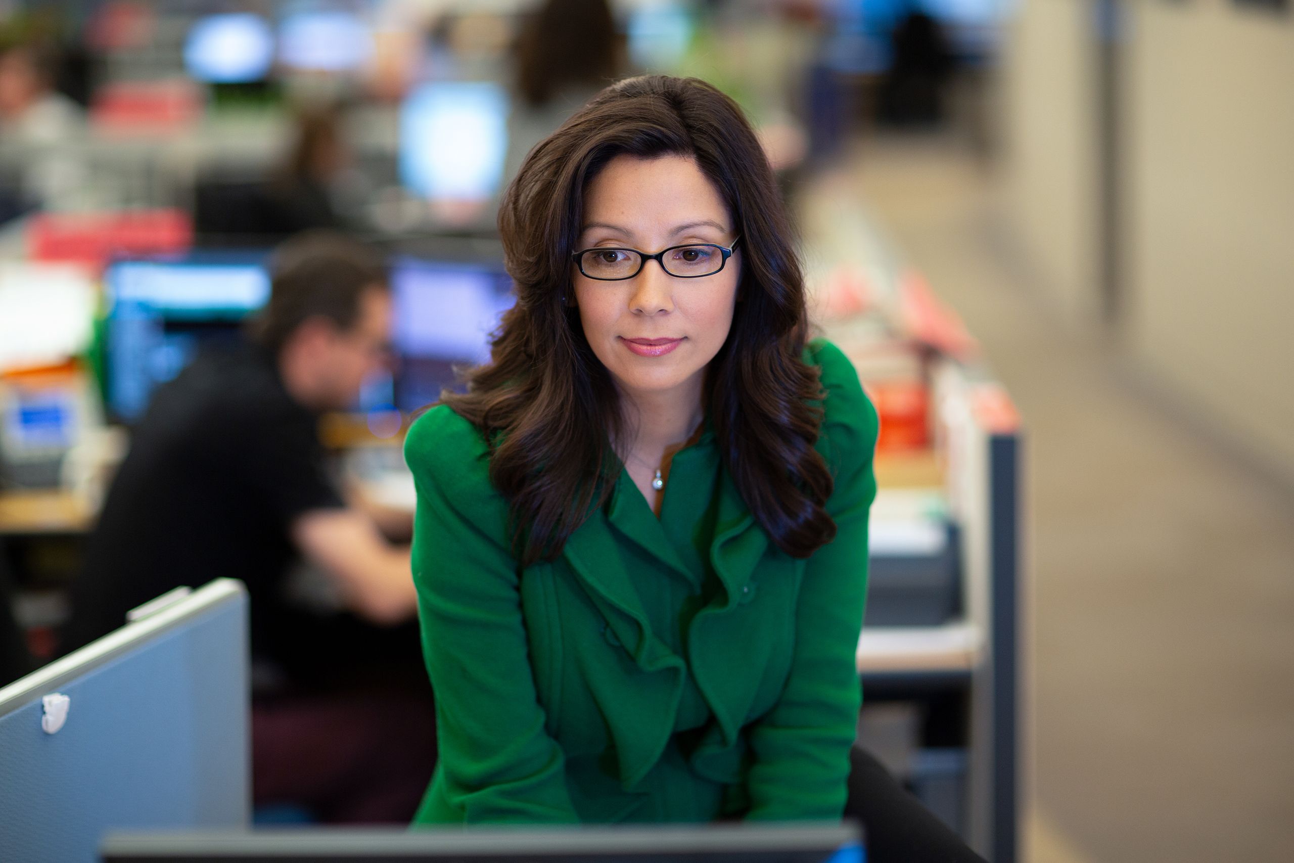 Elizabeth Koraca, Reuters TV Journalist — Office Portrait Scanning a Screen