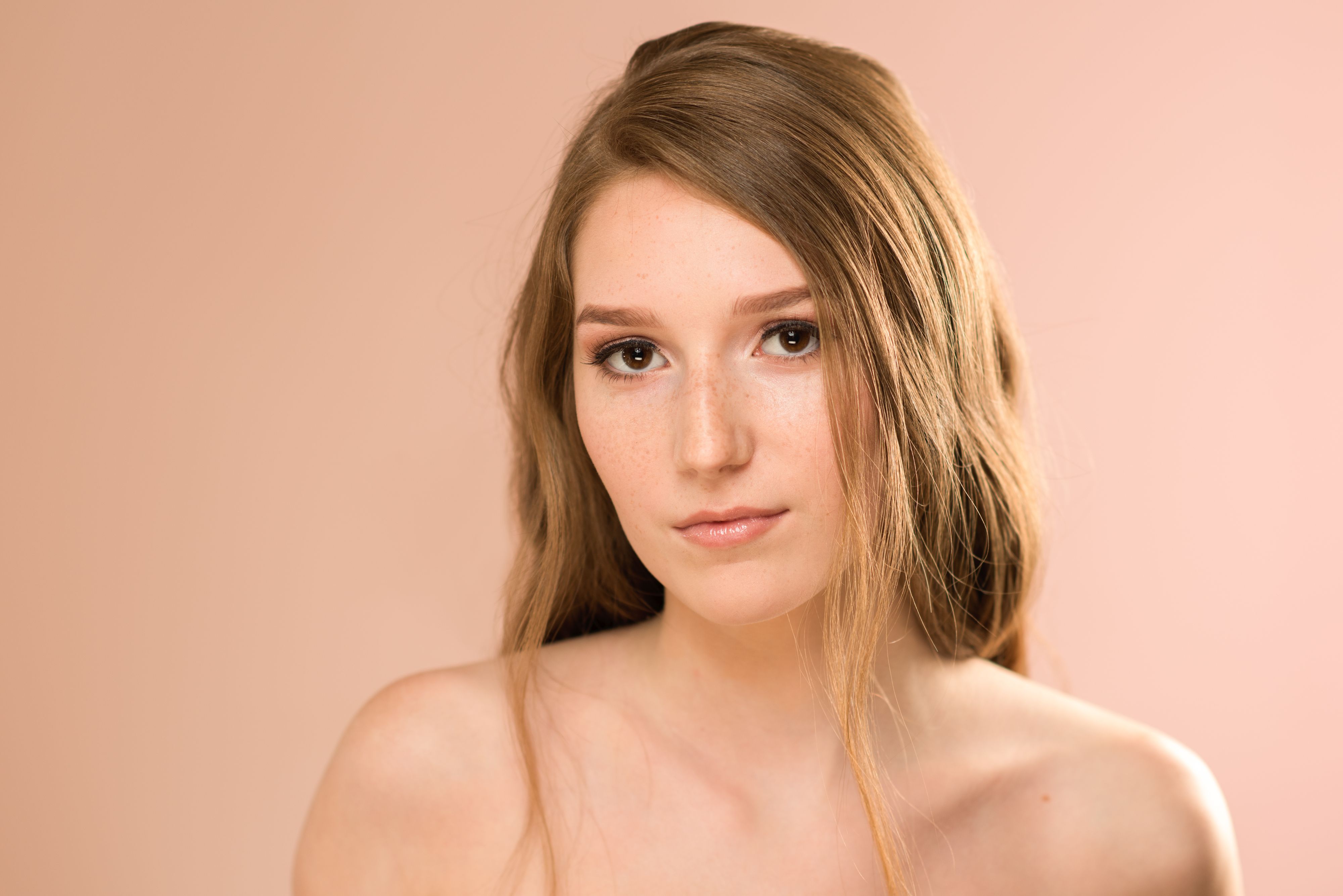 Topless female model beauty on pink background