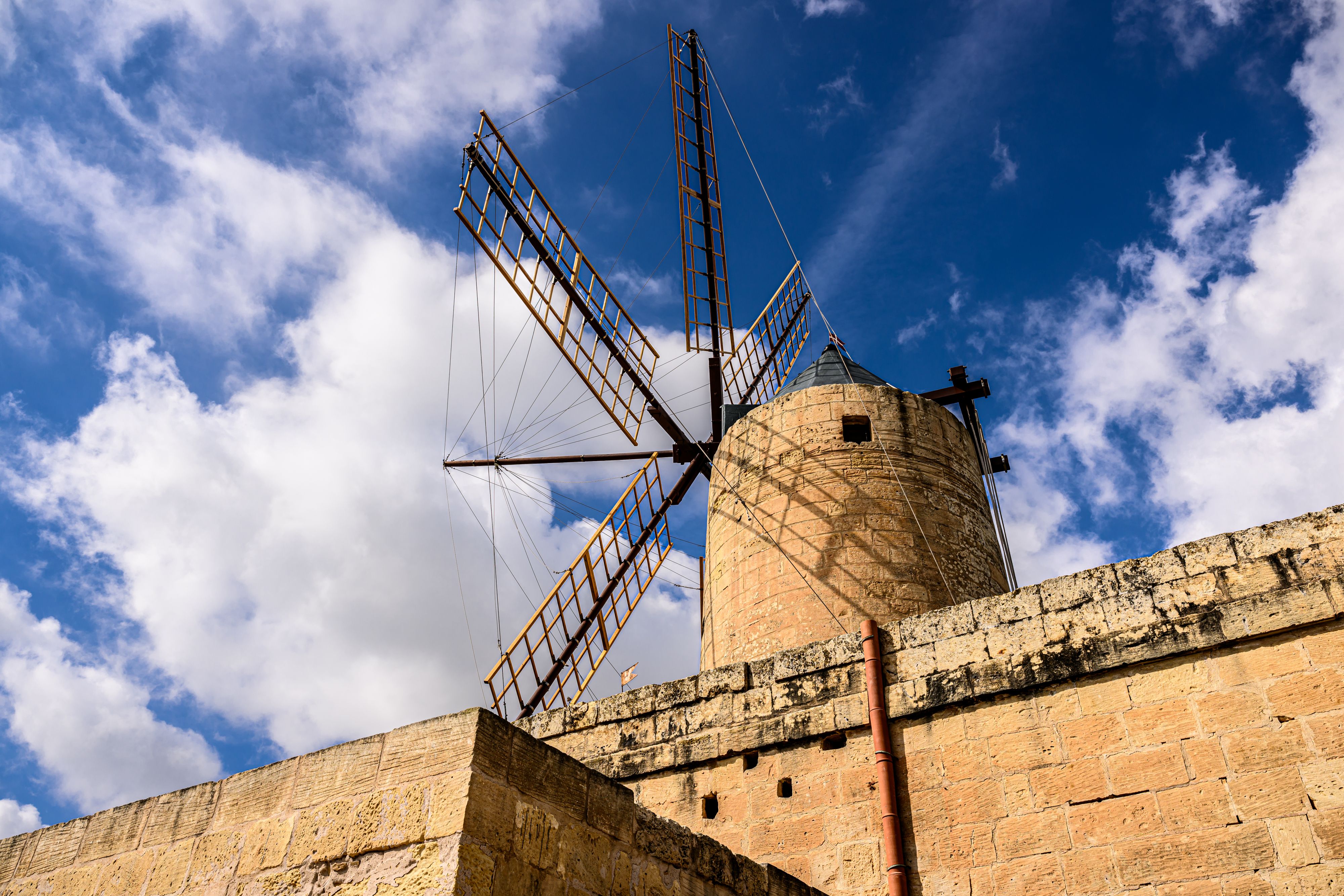 Looking up at antique Maltese windmill
