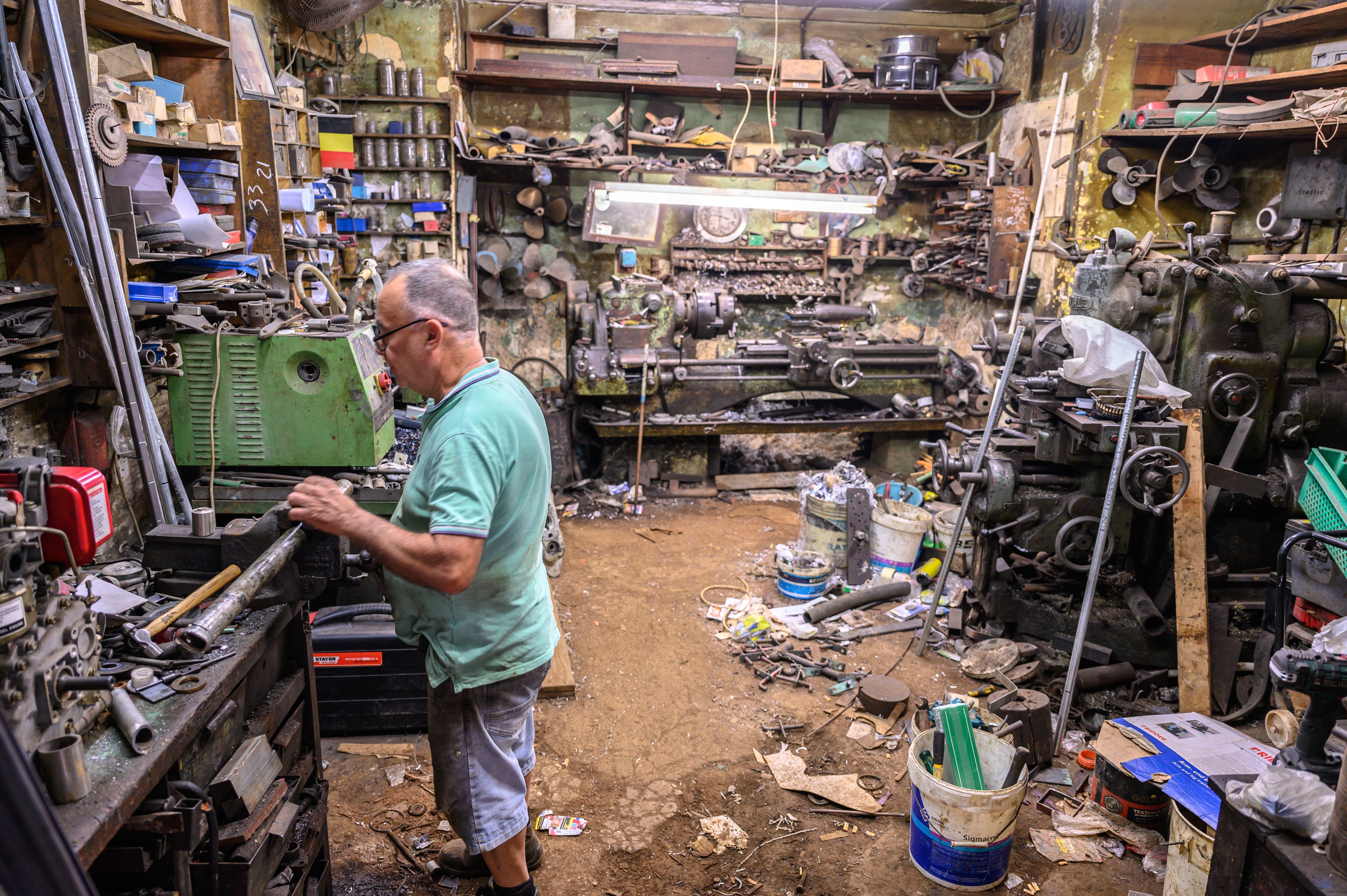 Man in family machine shop Valletta Malta