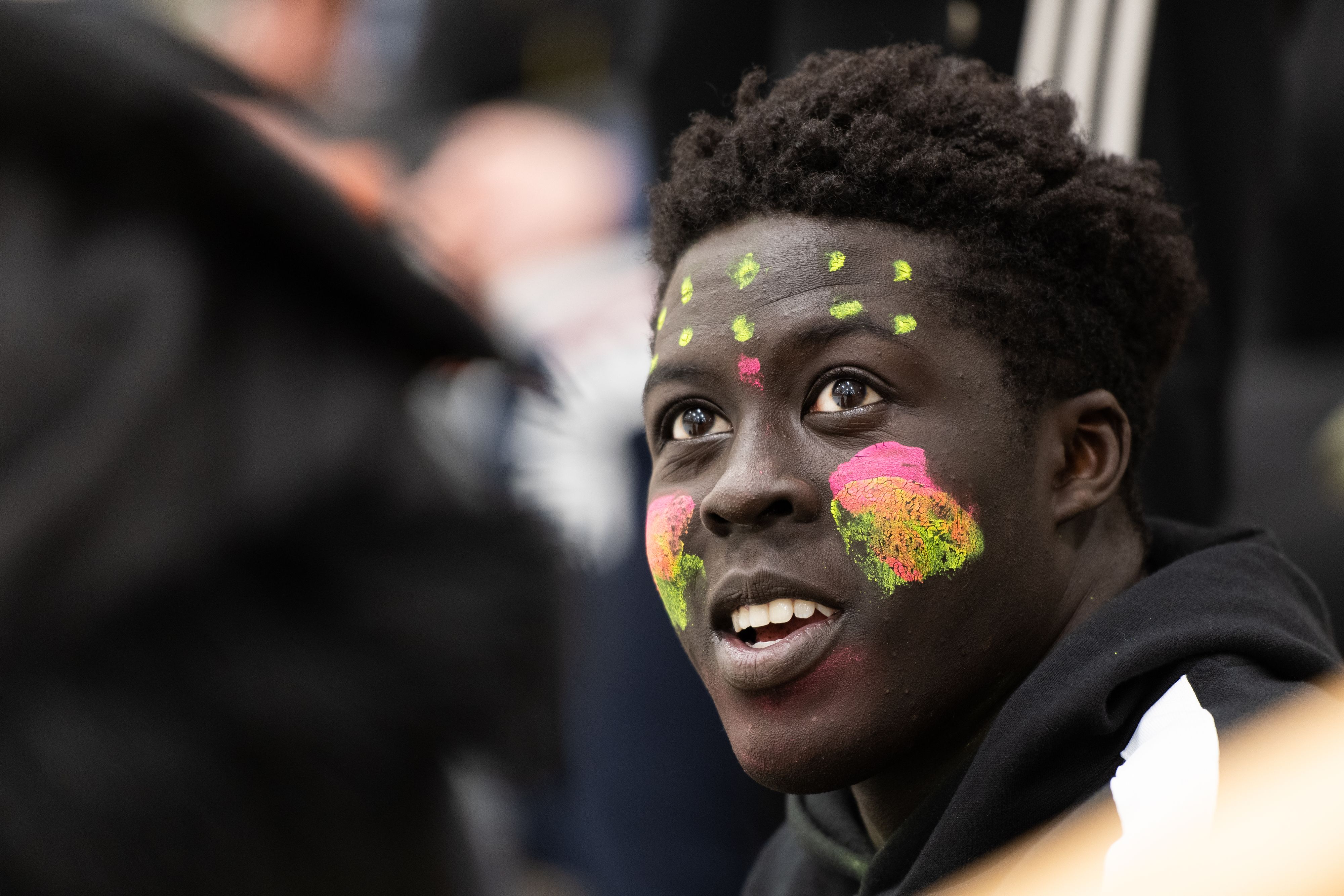 African American high school student with painted face
