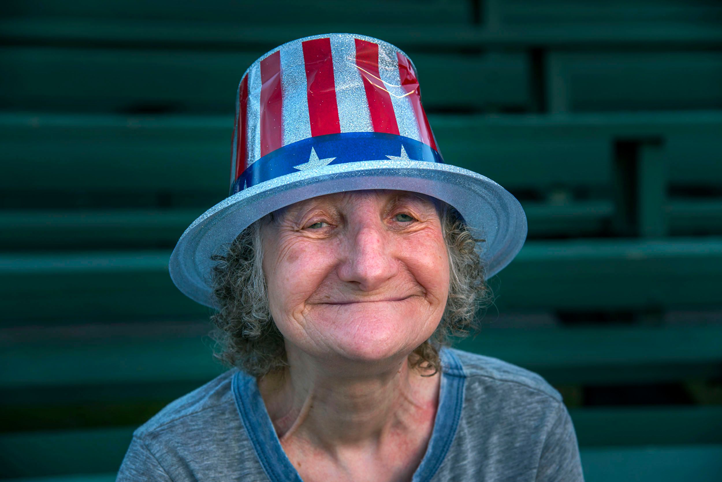 Woman with American Flag Hat