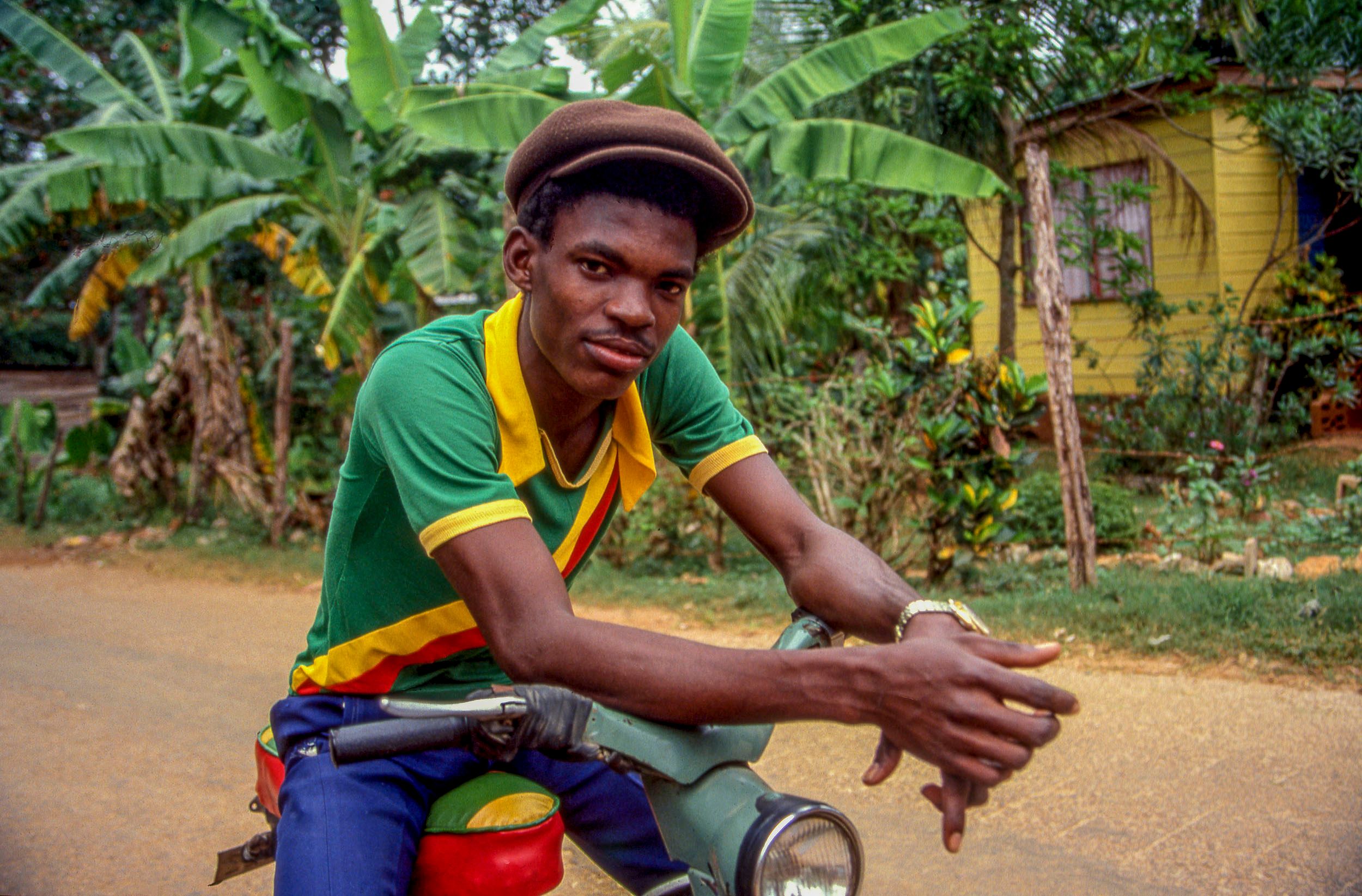 Portrait of young man with scooter