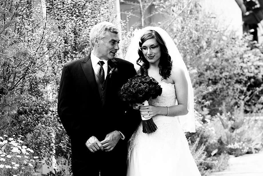 Father of the bride and the bride.