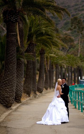 Bride and groom together outside the Casino Building , Catalina Island, Avalon.