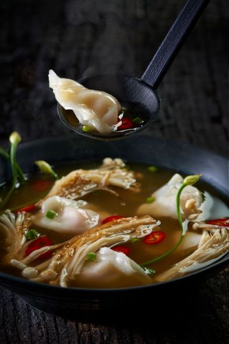 Dumpling Soup with Ladle Dark Moody Food Photography