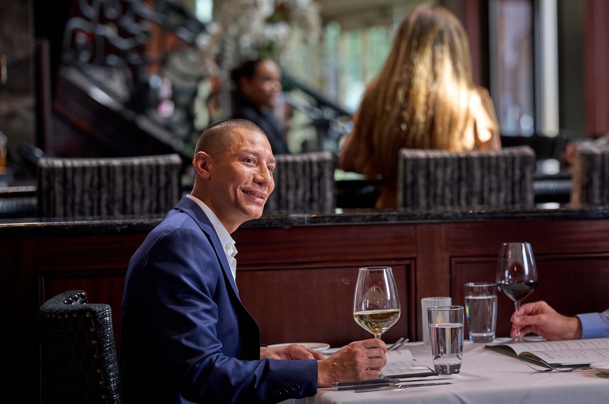 Corporate dining restaurant photography business dinner wine service Dallas