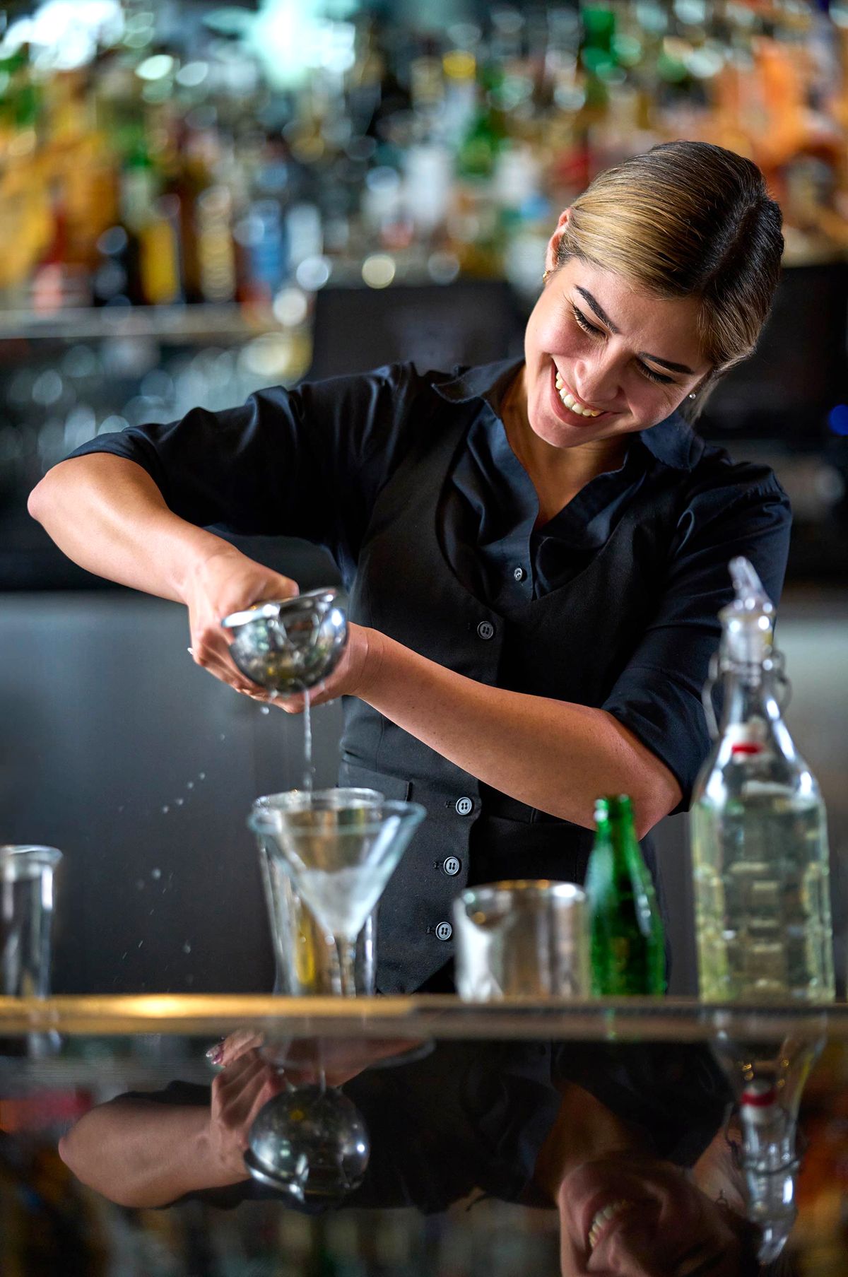 Upscale Steakhouse Bartender Crafting Cocktail Action Shot