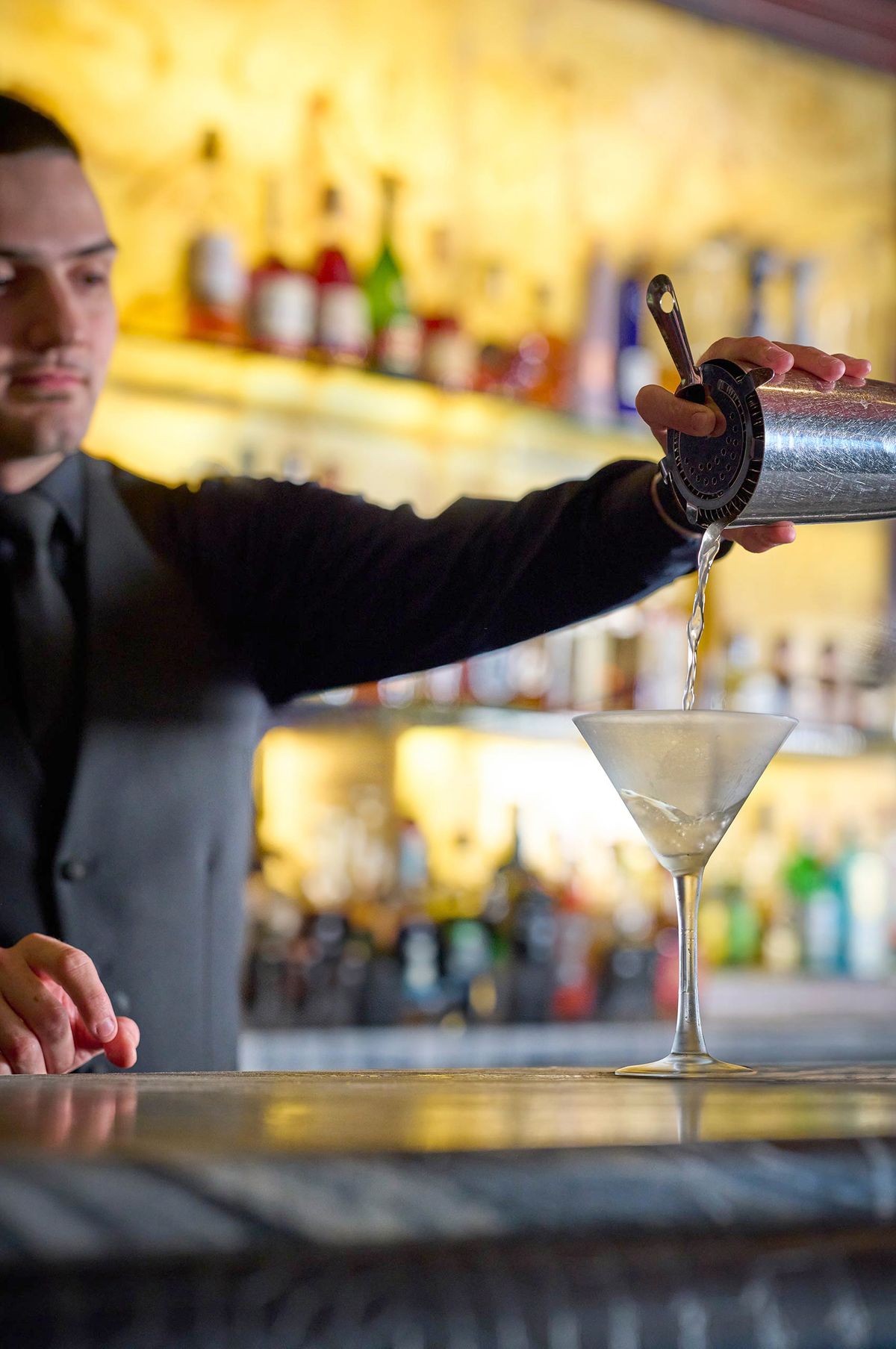 Mixologist Pouring Premium Martini at Del Frisco's