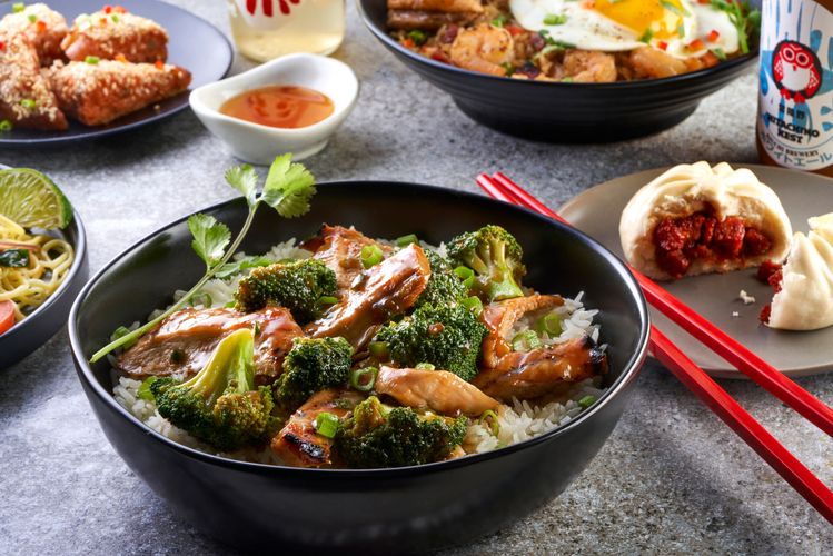 Chicken Broccoli Rice Bowl with Bao Bun Appetizers Restaurant Photo