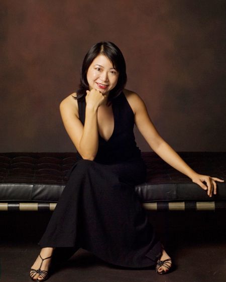 Born in Shanghai Chinese pianist made her New York recital debut with Midori. JIAYI SHI- Pianist