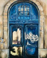 Painting of a blue door with silver leaf graffiti