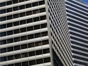 Unique low-angle perspective of modern high-rise towers and minimalist skyscraper architecture in San Francisco by William Curtis Rolf.