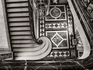 Black and white architectural photograph of the grand staircase curves at Château de Sceaux by William Curtis Rolf. Featured in on-site museum exhibitions. Château de Sceaux Grand Staircase Black White Art Print